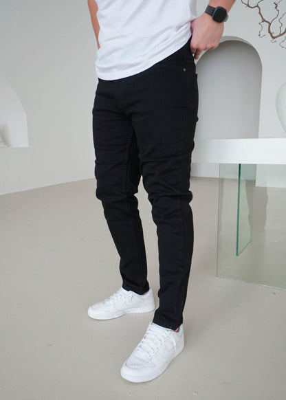 Relaxed Tapered Jeans In Jet Black